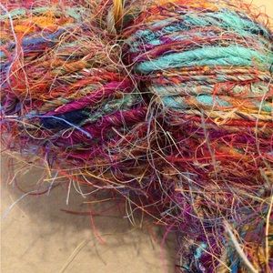 YARNSari silk imported by Muench 100% recycled silk. Knit, crochet,weave,rug